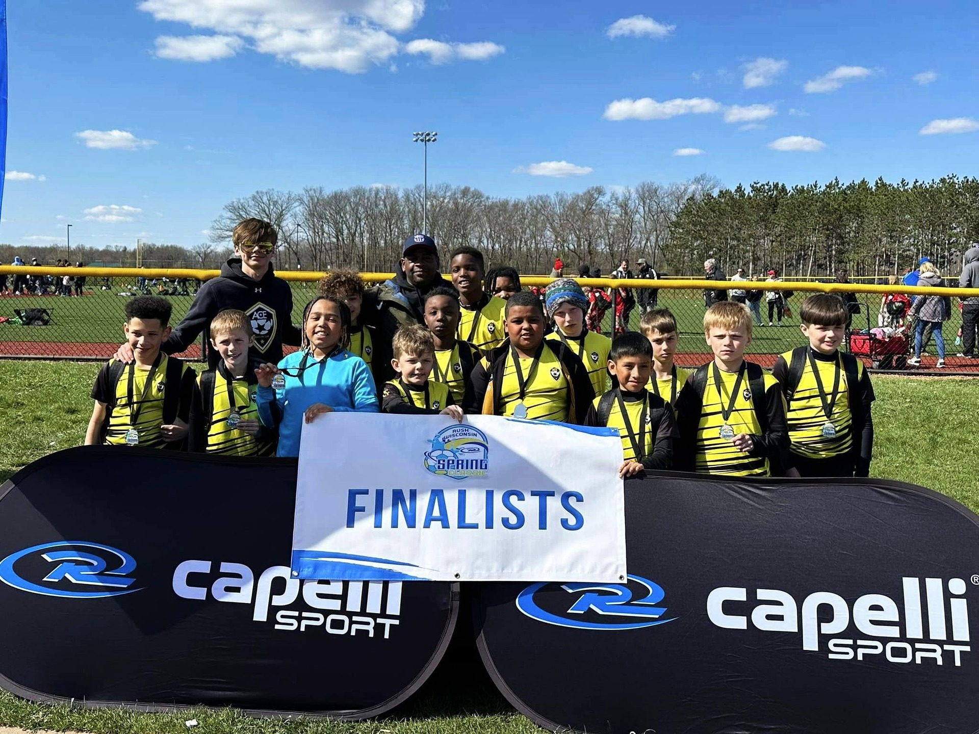 ACE Boys team with Finalists banner at Capelli Sport tournament